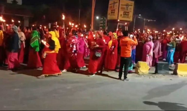 Women torch bearers demonstrate rally demanding withdrawal of SoO with Kuki militants, to remove AR from Manipur